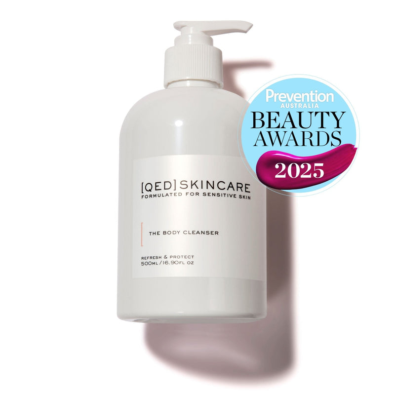 White pump bottle with skincare label and award seal.