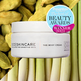 White cylindrical jar of qed skincare body cream for sensitive skin with lemongrass and cardamom to help skin feel beautiful