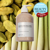 A translucent body exfoliator bottle with white pump from qed skincare for sensitive skin types perfect for limited sale